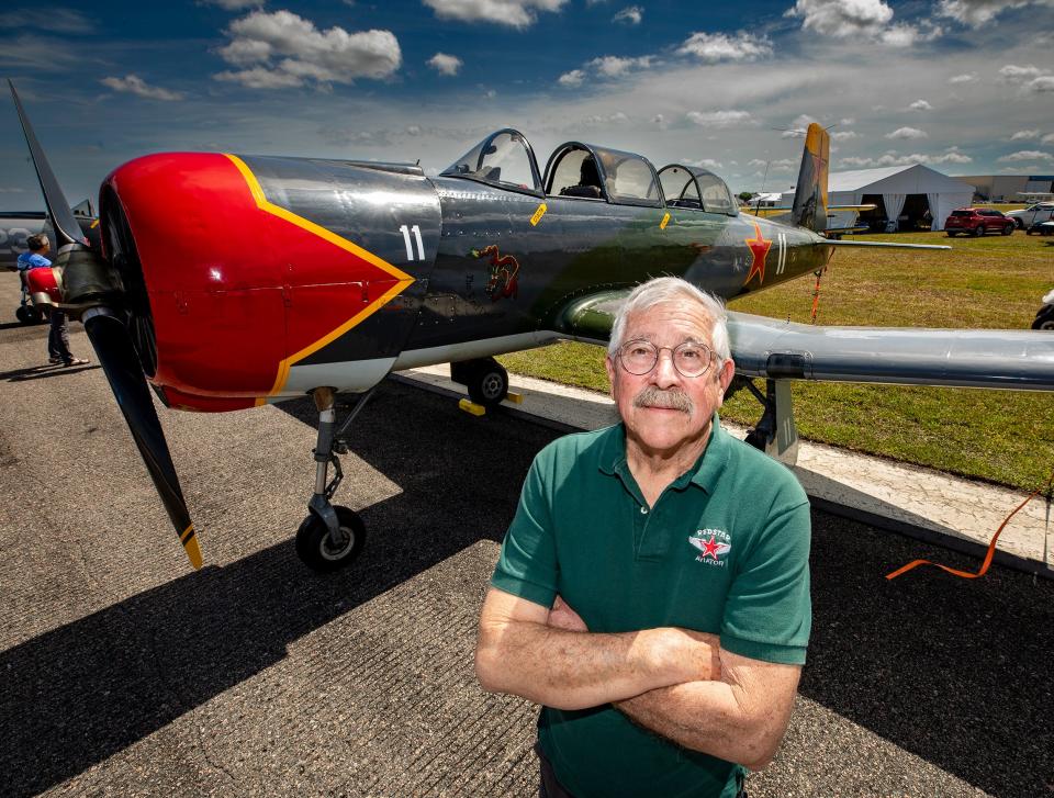 Bob Graves, of Columbus, Indiana, with his Nanchang CJ-6 at Sun 'n Fun. Graves said it's patterned after the Russian Yak-18.