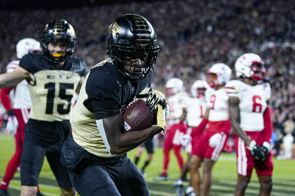 Purdue wide receiver TJ Sheffield (8) makes a catch for a touchdown against Nebraska during the first half of an NCAA college football game in West Lafayette, Ind., Saturday, Oct. 15, 2022. (AP Photo/Michael Conroy)