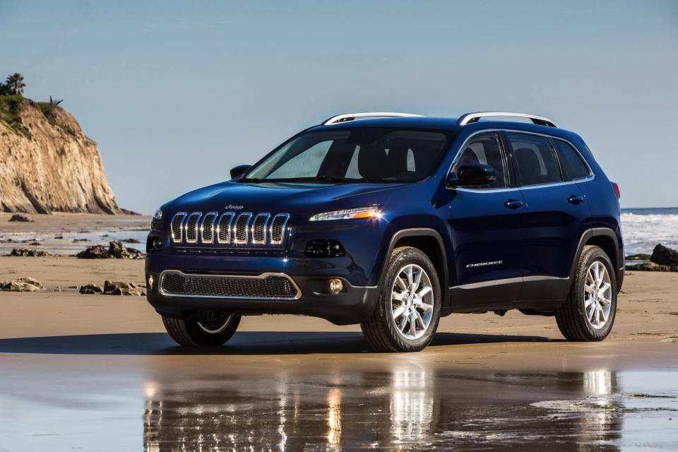 This undated publicity photo provided by the Chrysler Group LLC shows the all-new 2014 Jeep Cherokee Limited. The new Cherokee has a dramatic look that makes one wonder if it’s a Jeep. It ditches the traditional boxy look for a more aerodynamic style and replaces the brand’s round headlights with sharply angled slits. It has a much smaller grille. (AP Photo/Chrysler Group LLC)