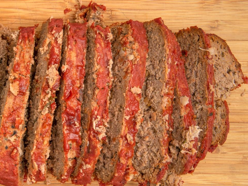 Meatloaf slices on cutting board