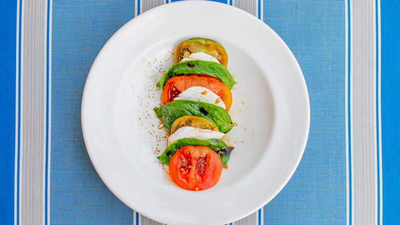 Mozzarella, tomato, and basil layers