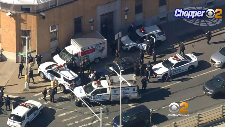 Police surround a U-Haul truck after multiple people were struck by a vehicle in Bay Ridge, Brooklyn, on Feb. 13, 2023. / Credit: CBS New York