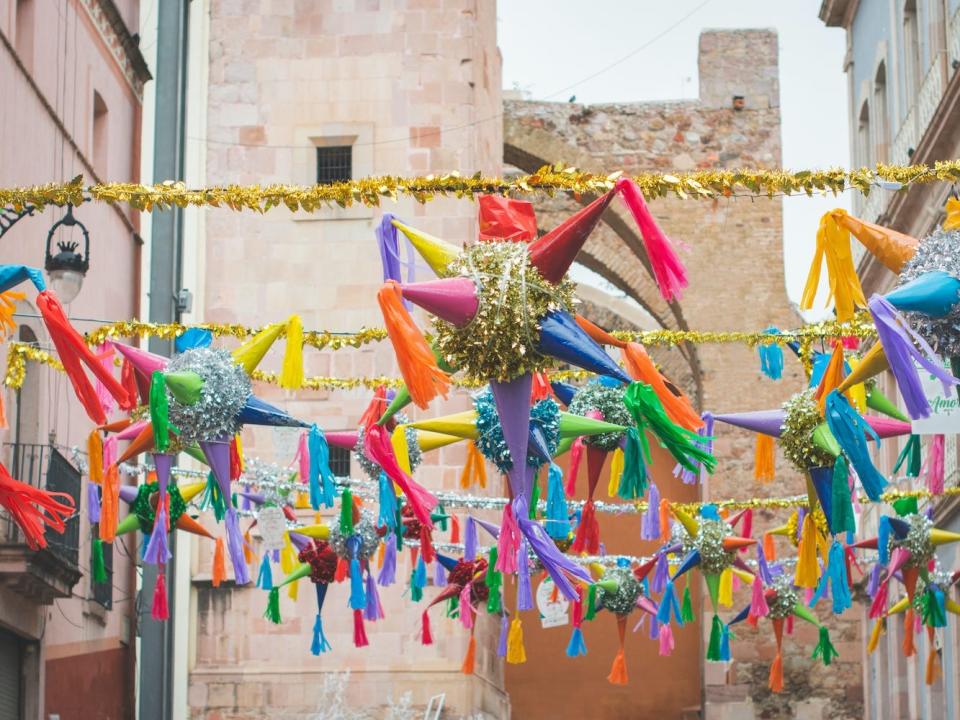 Piñatas often decorate the streets of Mexico during Christmastime.