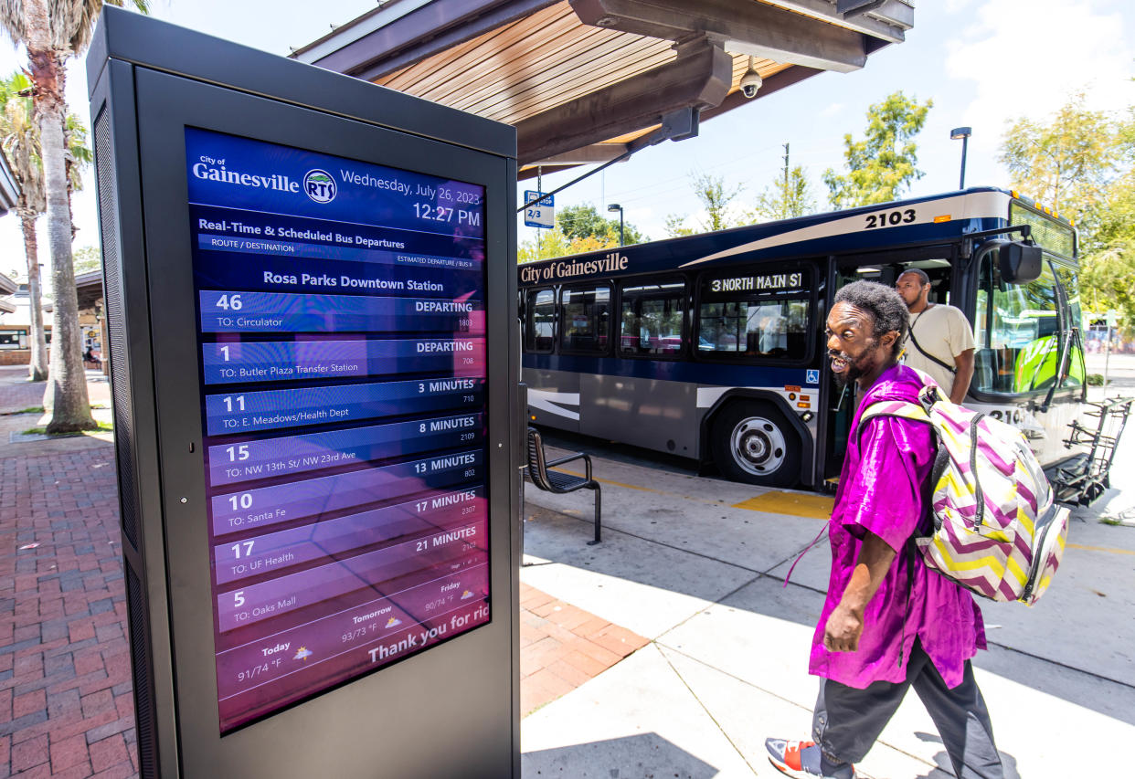 A bus rider checks out the bus schedule at the Rosa Parks Downtown Station Wednesday afternoon, July 26, 2023. Gainesville Regional Transit System has announced that they are terminating a number of different bus routes. [Doug Engle/Ocala Star Banner]2023