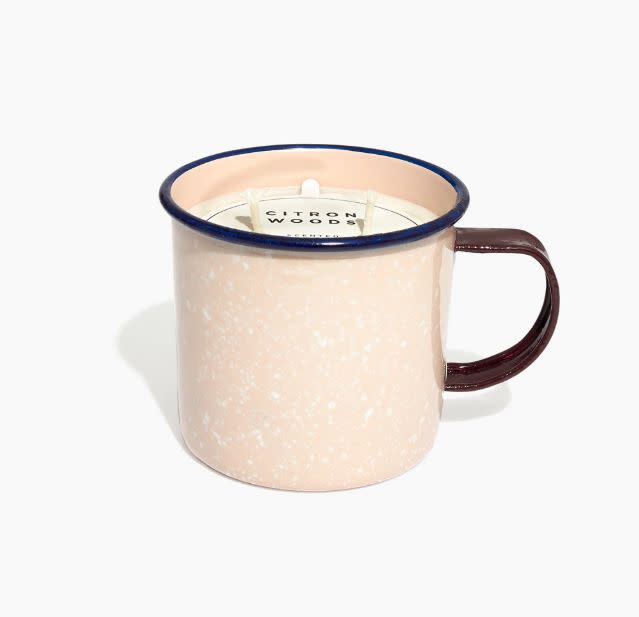 Coffee drinkers have probably been gifted so many coffee mugs, their kitchen cabinets are fit to burst. Instead, gift them one that has another purse &mdash; one that holds a festive-scented candle. Get this enamel <strong><a href="https://www.madewell.com/enamel-mug-candle-99105148684.html" target="_blank" rel="noopener noreferrer">mug candle on sale at Madewell right now</a></strong> for under $20.