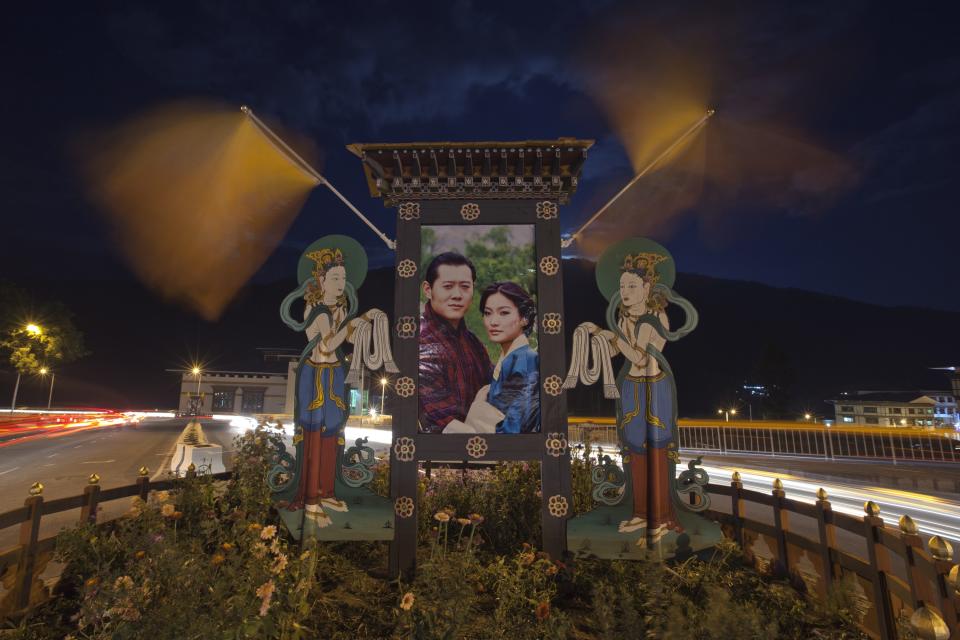 An portrait of Bhutan's King Jigme Khesar Namgyel Wangchuck and his fiancee Jetsun Pema is seen pictured in a roundabout in the capital Thimphu
