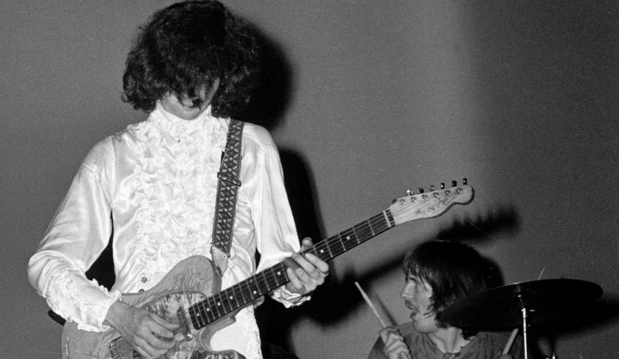  Jimmy Page (left) and John Bonham perform onstage with Led Zeppelin at the Gladsaxe Teen Club in Gladsaxe, Denmark on September 7, 1968 