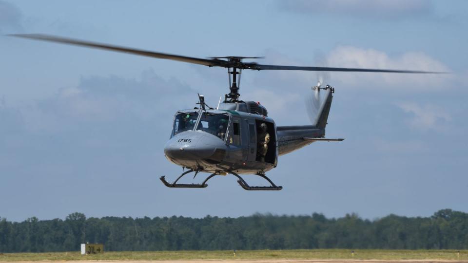 Airmen assigned to the 23rd Flying Training Squadron at Fort Rucker, Ala., now known as Fort Novosel, prepare to land their a UH-1N Huey at Columbus Air Force Base, Miss., in August 2020. (Airman 1st Class Davis Donaldson/Air Force)