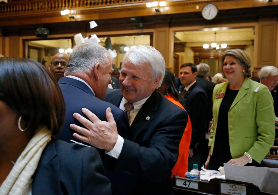 House majority leader Jon Burns, R-Newington, center, celebrates with House Speaker David Ralston, R-Blue Ridge, after the conclusion of the final day of the Georgia General Assembly at the capitol in Atlanta on Friday, March 25, 2016. Burns appears ready to take over as speaker after the retirement and then death of Ralston. (Photo: Jason Getz / Associated Press)