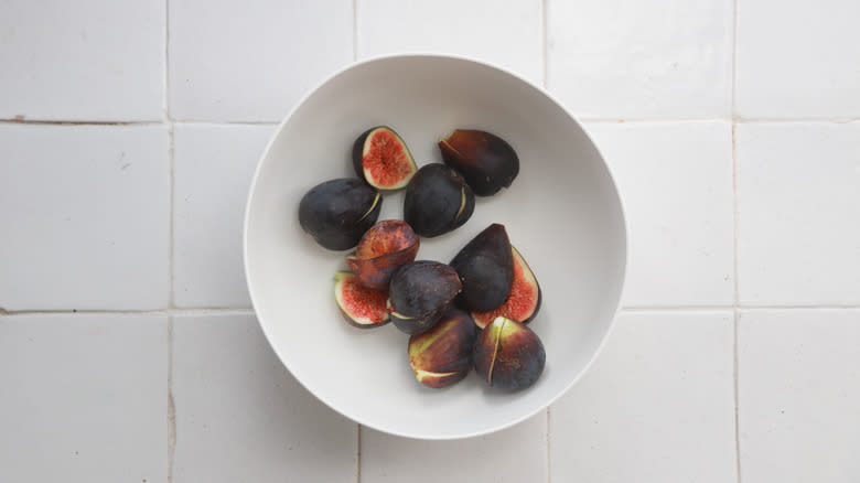Bowl of cut figs