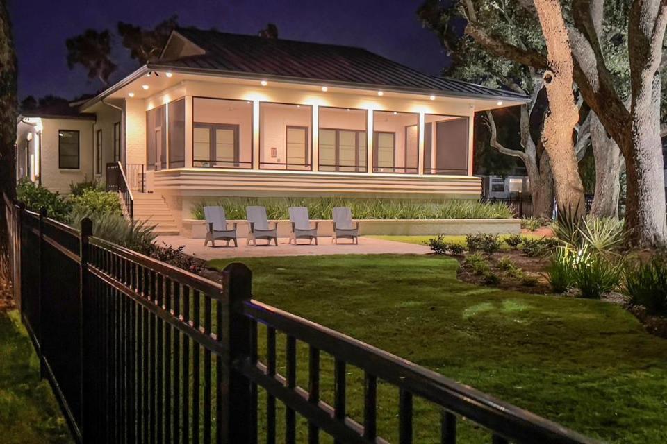 Night glow illuminates this winning home built by Plum Homes of Gulfport.