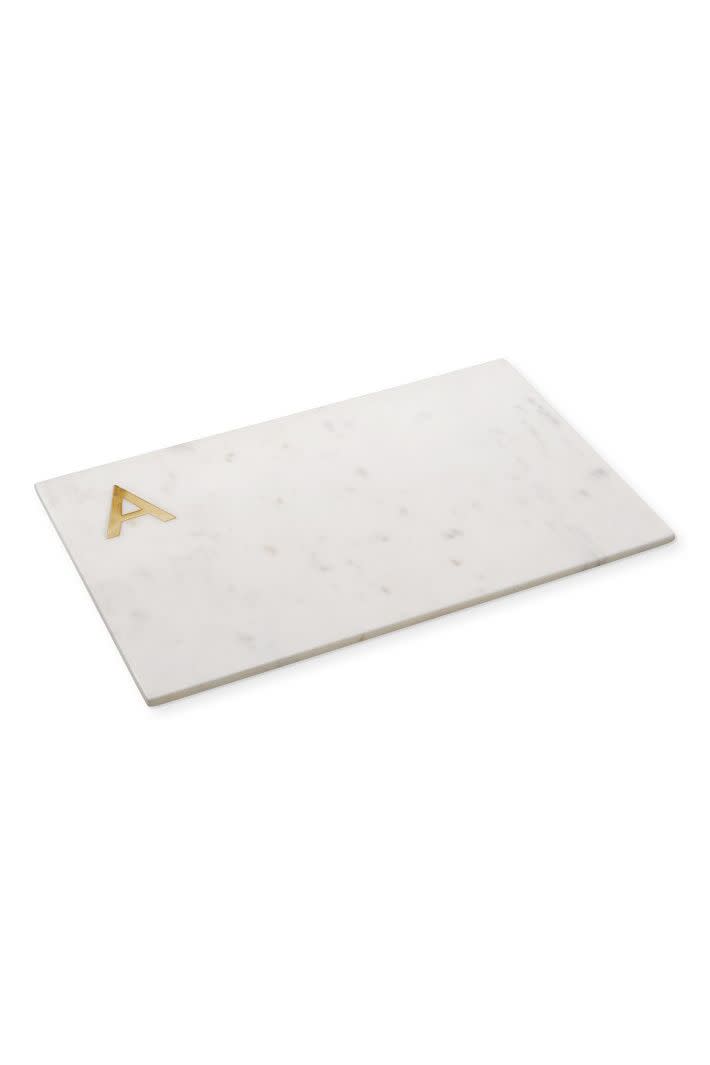 <p><a href="https://go.redirectingat.com?id=74968X1596630&url=https%3A%2F%2Fwww.williams-sonoma.com%2Fproducts%2Fmarble-and-brass-monogram-board&sref=https%3A%2F%2Fwww.townandcountrymag.com%2Fleisure%2Fg12237114%2Fbest-thanksgiving-hostess-gift-ideas%2F" rel="nofollow noopener" target="_blank" data-ylk="slk:Shop Now;elm:context_link;itc:0;sec:content-canvas" class="link rapid-noclick-resp">Shop Now</a></p><p>Marble & Brass Monogram Board</p><p>williams-sonoma.com</p><p>$49.95</p>