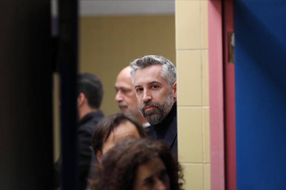 Socialist Party leader Pedro Nuno Santos waits to cast his ballot at a polling station in Lisbon, Sunday, March 10, 2024. Portugal is holding an early general election on Sunday when 10.8 million registered voters elect 230 lawmakers to the National Assembly, the country's Parliament. (AP Photo/Joao Henriques)