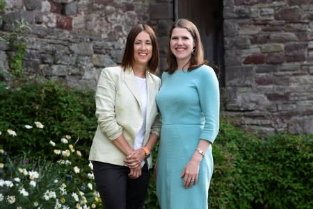 Jane Dodds poses for a picture with Liberal Democrat leader Jo Swinson as they celebrate winning the Brecon and Radnorshire by-election in Brecon
