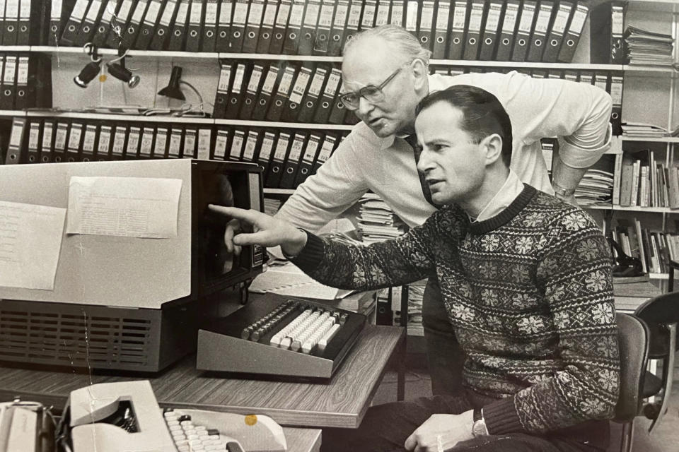 In this undated family handout, Roland Prinz is seen in the Associated Press office in Vienna. Prinz, who was born as armies began marching across central Europe then spent nearly four decades covering the Cold War and the fall of communism for The Associated Press, has died it was announced Friday, Dec 1, 2023. He was 85. (Family Handout via AP)