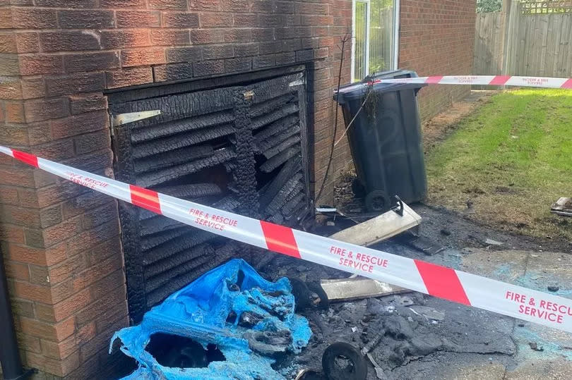 The remnants of a blue wheelie bin -Credit:Manchester Evening News