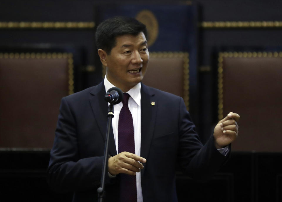Tibetan government-in-exile Prime Minister Lobsang Sangay delivers a speech at the Prague's city hall during his visit to Czech Republic, Wednesday, March 6, 2019. (AP Photo/Petr David Josek)