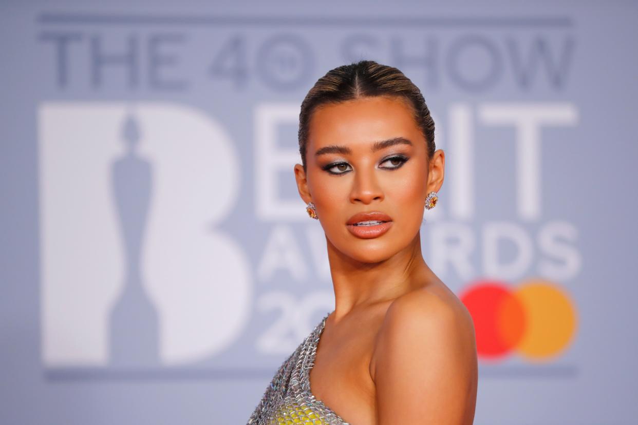 Television celebrity Montana Brown poses on the red carpet on arrival for the BRIT Awards 2020 in London on February 18, 2020. (Photo by Tolga AKMEN / AFP) / RESTRICTED TO EDITORIAL USE  NO POSTERS  NO MERCHANDISE NO USE IN PUBLICATIONS DEVOTED TO ARTISTS (Photo by TOLGA AKMEN/AFP via Getty Images)