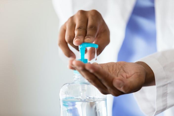 Washing your hands reduces your risk of transmitting and contracting harmful bacteria from other people and the environment. <a href="https://www.gettyimages.com/detail/photo/female-doctor-uses-hand-santizer-royalty-free-image/1254704741" rel="nofollow noopener" target="_blank" data-ylk="slk:SDI Productions/E+ via Getty Images" class="link ">SDI Productions/E+ via Getty Images</a>