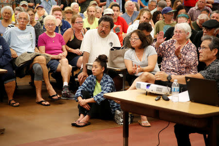 Puna district residents attend a community meeting during ongoing eruptions of the Kilauea Volcano at Pahoa High and Intermediate School in Pahoa, Hawaii, U.S., May 7, 2018. REUTERS/Terray Sylvester