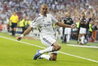 Real Madrid's Pepe celebrates after scoring against Barcelona during their Spanish first division "Clasico" soccer match at the Santiago Bernabeu stadium in Madrid October 25, 2014. REUTERS/Sergio Perez (SPAIN - Tags: SOCCER SPORT)