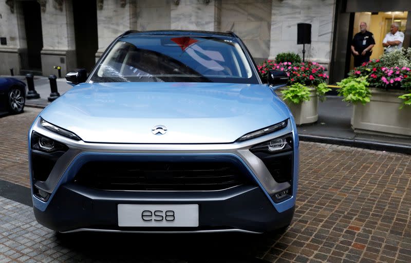 FILE PHOTO: Chinese electric vehicle start-up Nio Inc. vehicles are on display in front of the NYSE to celebrate the company’s IPO in New York