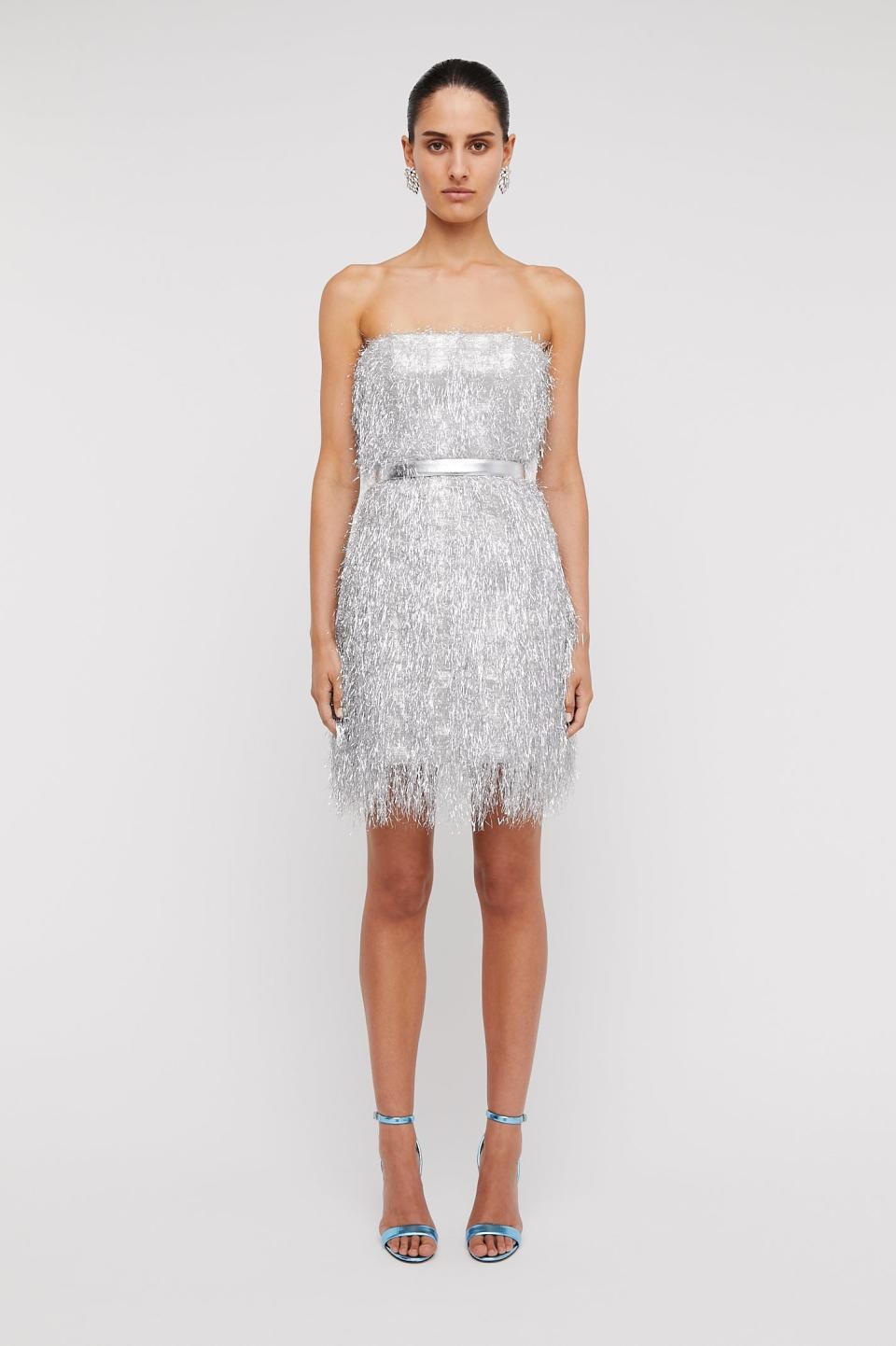 <p><a href="https://us.scanlantheodore.com/products/tinsel-mini-dress-silver?variant=42487121445041" rel="nofollow noopener" target="_blank" data-ylk="slk:Shop Now;elm:context_link;itc:0;sec:content-canvas" class="link ">Shop Now</a></p><p>Tinsel Mini Dress Silver</p><p>$1400.00</p><p>scanlantheodore.com</p>