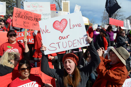 McGlone Academy special education teacher Acadia Yondorf (C) reacts during a rally as Denver public school teachers strike for a second day in Denver, Colorado, U.S., February 12, 2019. REUTERS/Michael Ciaglo