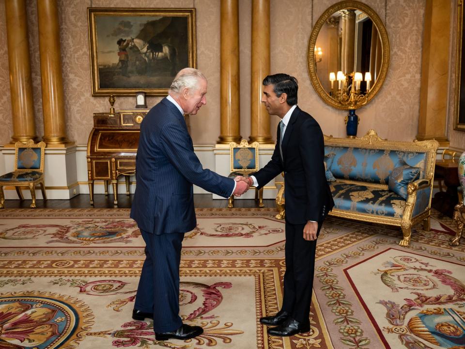 King Charles III welcomes Rishi Sunak during an audience at Buckingham Palace, where he invited the newly elected leader of the Conservative Party to become Prime Minister and form a new government on October 25, 2022