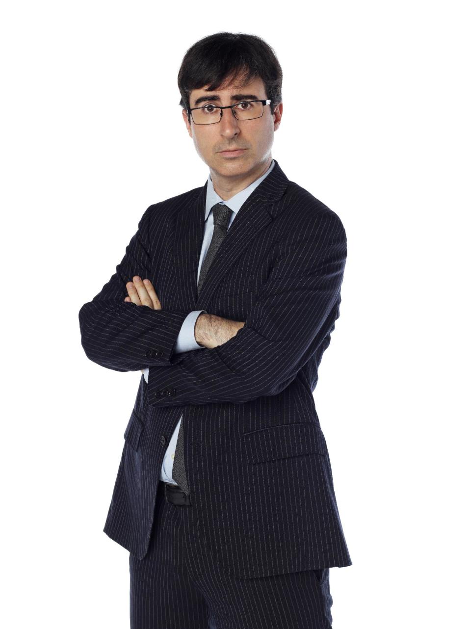 This undated image released by Comedy Central shows John Oliver, a correspondent from "The Daily Show with Jon Stewart." Oliver will temporarily replace host Jon Stewart on the popular spoof news show while Stewart directs and produces the film, "Rosewater." (AP Photo/Comedy Central, Martin Crook)