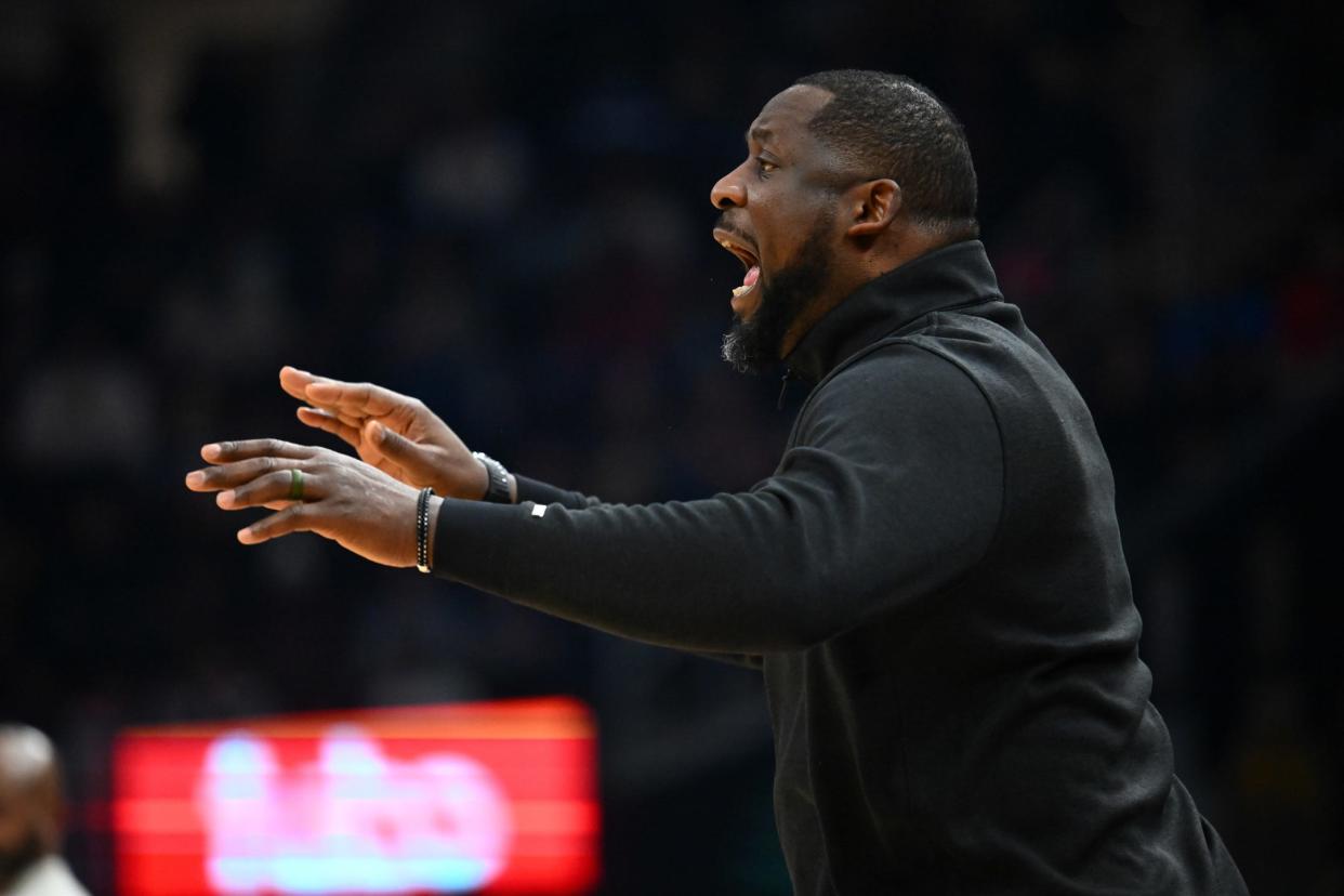 Head coach Adrian Griffin of the Milwaukee Bucks yells to his players during the first half at Rocket Mortgage Fieldhouse on January 17, 2024 in Cleveland, Ohio.