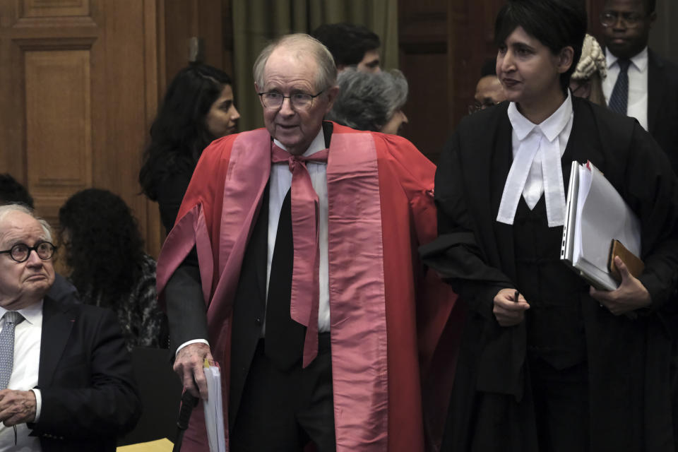 South African legal adviser John Dugard arrives for a hearing at the International Court of Justice in The Hague, Netherlands, Friday, Jan. 12, 2024. The United Nations' top court opened hearings Thursday into South Africa's allegation that Israel's war with Hamas amounts to genocide against Palestinians, a claim that Israel strongly denies. (AP Photo/Patrick Post)