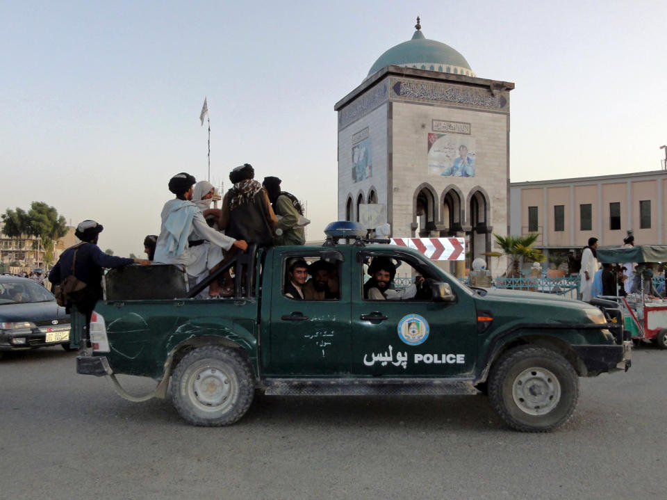 Taliban fighters patrol inside the city of Kandahar (Sidiqullah Khan/AP)