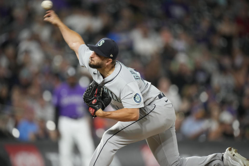 Seattle Mariners relief pitcher Kendall Graveman works against the Colorado Rockies during the ninth inning of a baseball game Tuesday, July 20, 2021, in Denver. The Mariners won 6-4. (AP Photo/David Zalubowski)