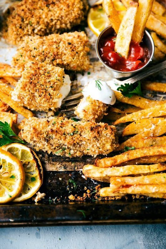 <p>Chelsea's Messy Apron</p><p>A quick and delicious take on fish and chips—all baked in just one pan. This version is healthier because it isn’t baked, but it certainly isn’t lacking in flavor! The fries are ultra crispy and flavorful, the fish has a secret hack to make it seem fried, and all prep is done in under 30 minutes.</p><p><strong>Get the recipe: <a href="https://www.chelseasmessyapron.com/one-pan-baked-fish-chips/" rel="nofollow noopener" target="_blank" data-ylk="slk:One-Pan Baked Fish and Chips;elm:context_link;itc:0;sec:content-canvas" class="link ">One-Pan Baked Fish and Chips</a></strong></p><p><strong>Related: <a href="https://www.yahoo.com/lifestyle/50-lent-worthy-baked-fish-222143318.html" data-ylk="slk:40 Best Baked Fish Recipes;elm:context_link;itc:0;sec:content-canvas;outcm:mb_qualified_link;_E:mb_qualified_link;ct:story;" class="link  yahoo-link">40 Best Baked Fish Recipes</a></strong></p>