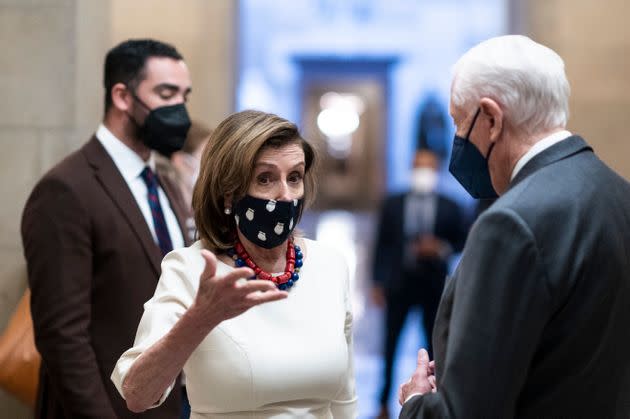 House Speaker Nancy Pelosi (D-Calif.) and Rep. Steny Hoyer (D-Md.) talk outside of the speaker's office. Pelosi said Thursday that she is open to banning lawmakers from owning and trading individual stocks if that's what members of her caucus want.  (Photo: Bill Clark via Getty Images)