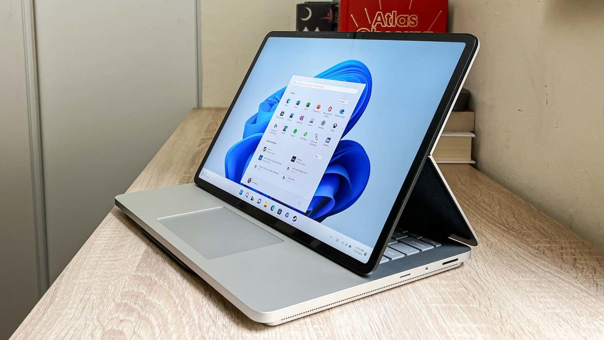  Microsoft Surface Laptop Studio 2 review unit on desk running Windows 11. 