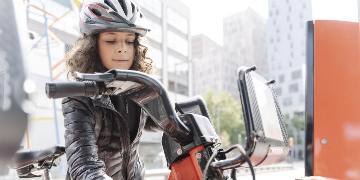 young woman riding an electric bike