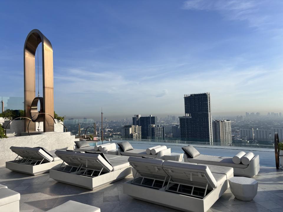 The Rooftop bar at INNSiDE by Meliá Bangkok Sukhumvit on a bright sunny day.