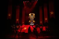 The cast performs during a photocall for a new production of "Miss Saigon" at the Prince Edward Theatre in London May 19, 2014. The production marks the 25th anniversary of the musical by Claude-Michel Schonberg and Alain Boubil. REUTERS/Luke MacGregor (BRITAIN - Tags: ENTERTAINMENT)