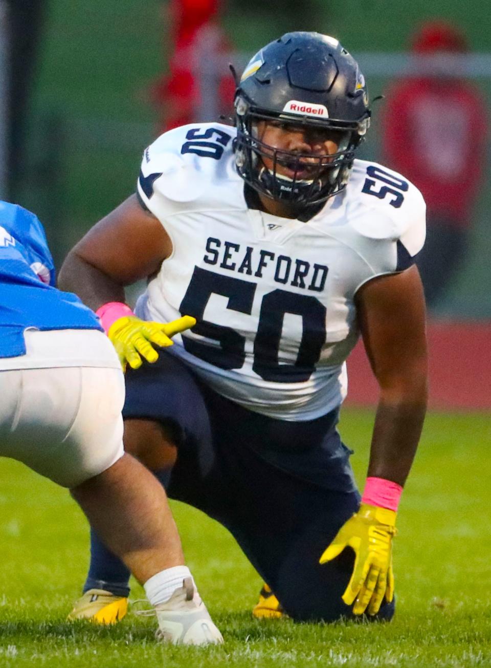 Seaford's Roman Maddox gets set to man the line in the first quarter of the Bulldogs' 14-7 overtime win at Brandywine, Friday, Oct. 20, 2023.