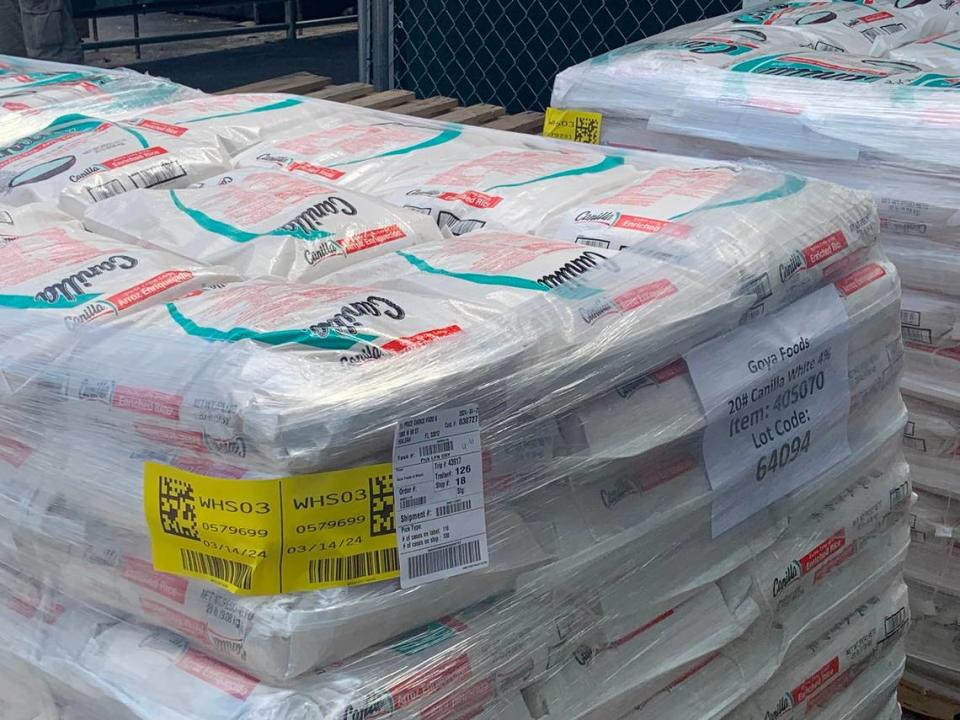 Pallets of Canilla Extra Long Grain Enriched White Rice from Goya Foods on West 18th Lane behind the Hialeah Price Choice Foodmarket.