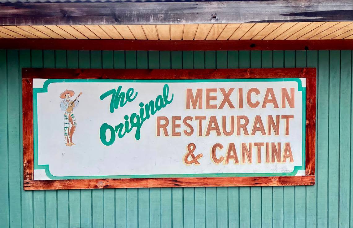 A faded sign on the back of The Original Mexican Restaurant in Fort Worth March 25, 2023. Bud Kennedy/bud@star-telegram.com