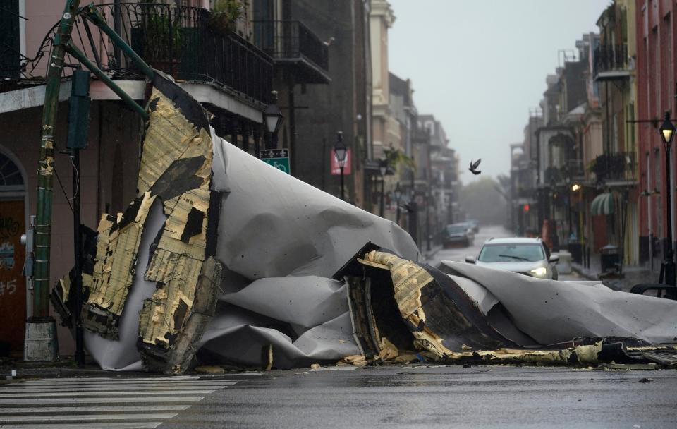 A section of roof that was blown off of a building in the French Quarter (AP Photo/Eric Gay)