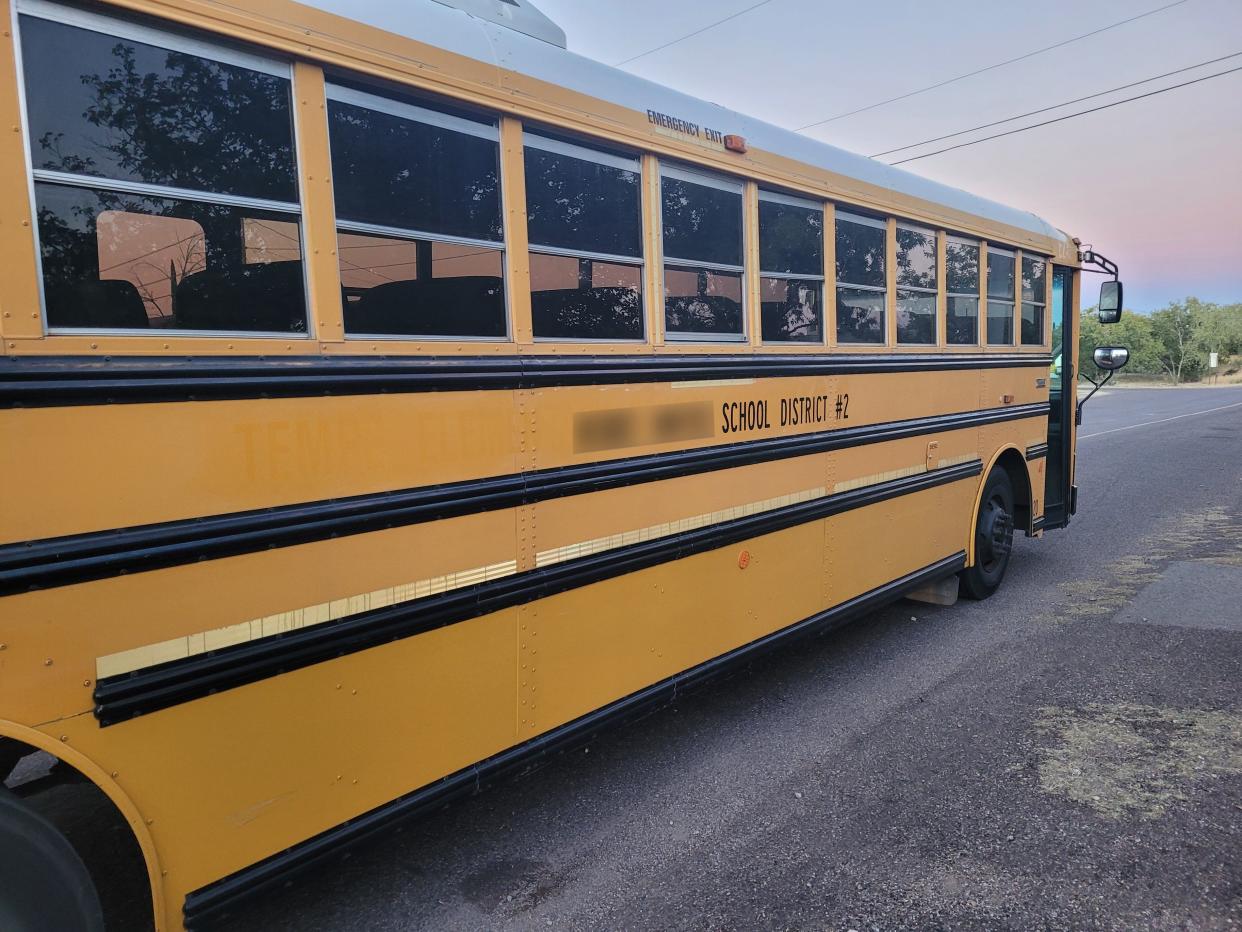 A school bus is seen in a photo from an arrest of a migrant-smuggling suspect who authorities say was also a school bus driver.