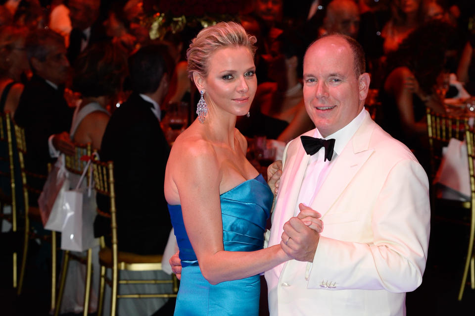 Princess Charlene of Monaco and Prince Albert II of Monaco dance during the 65th Monaco Red Cross Ball Gala at Sporting in Monaco. (Photo by Stephane Cardinale/Corbis via Getty Images)