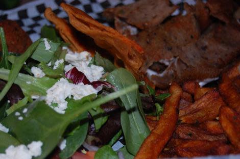 Gyro Platter. The platter comes with homemade seasoned fries, a side salad and gyro meat served with pita chips!!! Of course that is feta cheese, honey! Anything else would be uncivilized! 