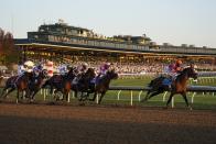 John Velazquez (9) rides Authentic to win the Breeder's Cup Classic horse race at Keeneland Race Course, in Lexington, Ky., Saturday, Nov. 7, 2020. (AP Photo/Mark Humphrey)