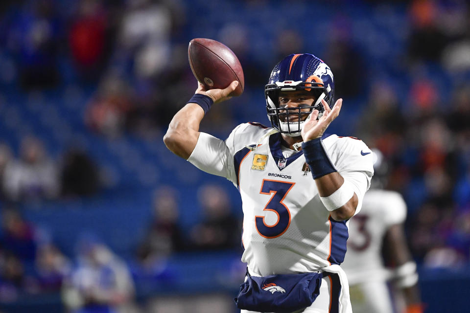 Denver Broncos quarterback Russell Wilson warms up before an NFL football game against the Buffalo Bills, Monday, Nov. 13, 2023, in Orchard Park, N.Y. (AP Photo/Adrian Kraus)