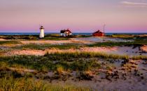 <p>Impossibly white beaches, marshes, and the lighthouses that decorate New England’s coast appear in abundance at the Cape Cod National Seashore. Tourists on the Cape can catch striped bass in the surf or from a charter boat, swim in the ocean on balmy summer days, or hike and bike along the region’s many miles of trails. Provincetown, commonly known by locals as P-town, is a colorful community where one can find nightlife, art, and great food. If you’re visiting during the summer, plan accordingly for traffic congestion.</p>